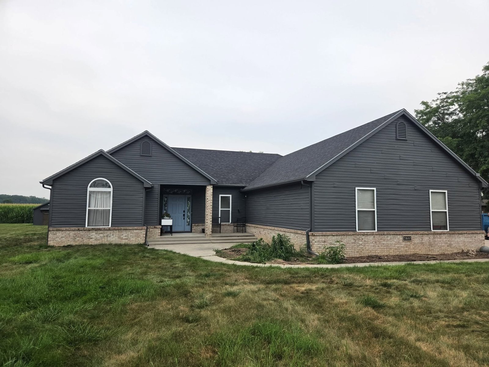 Completed residential roof replacement by Cox Roofing in Northwest Ohio